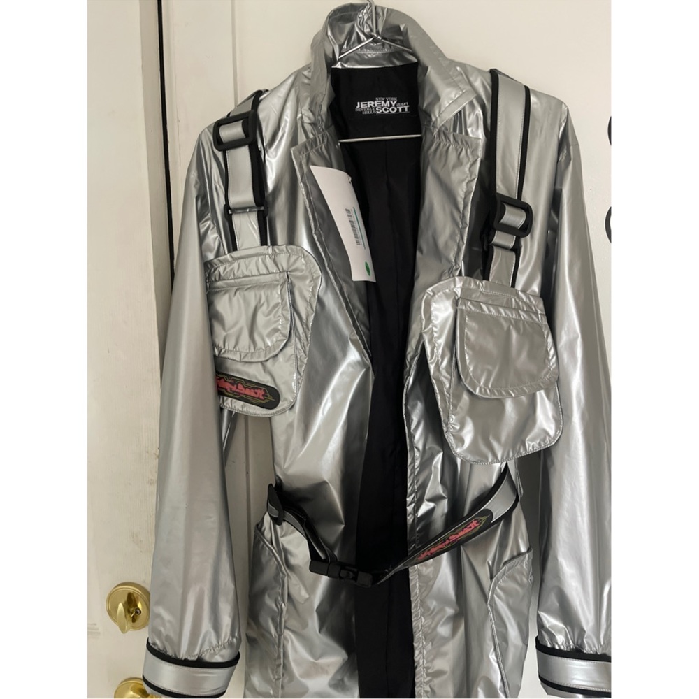 Jeremy Scott's silver metallic jacket size is small